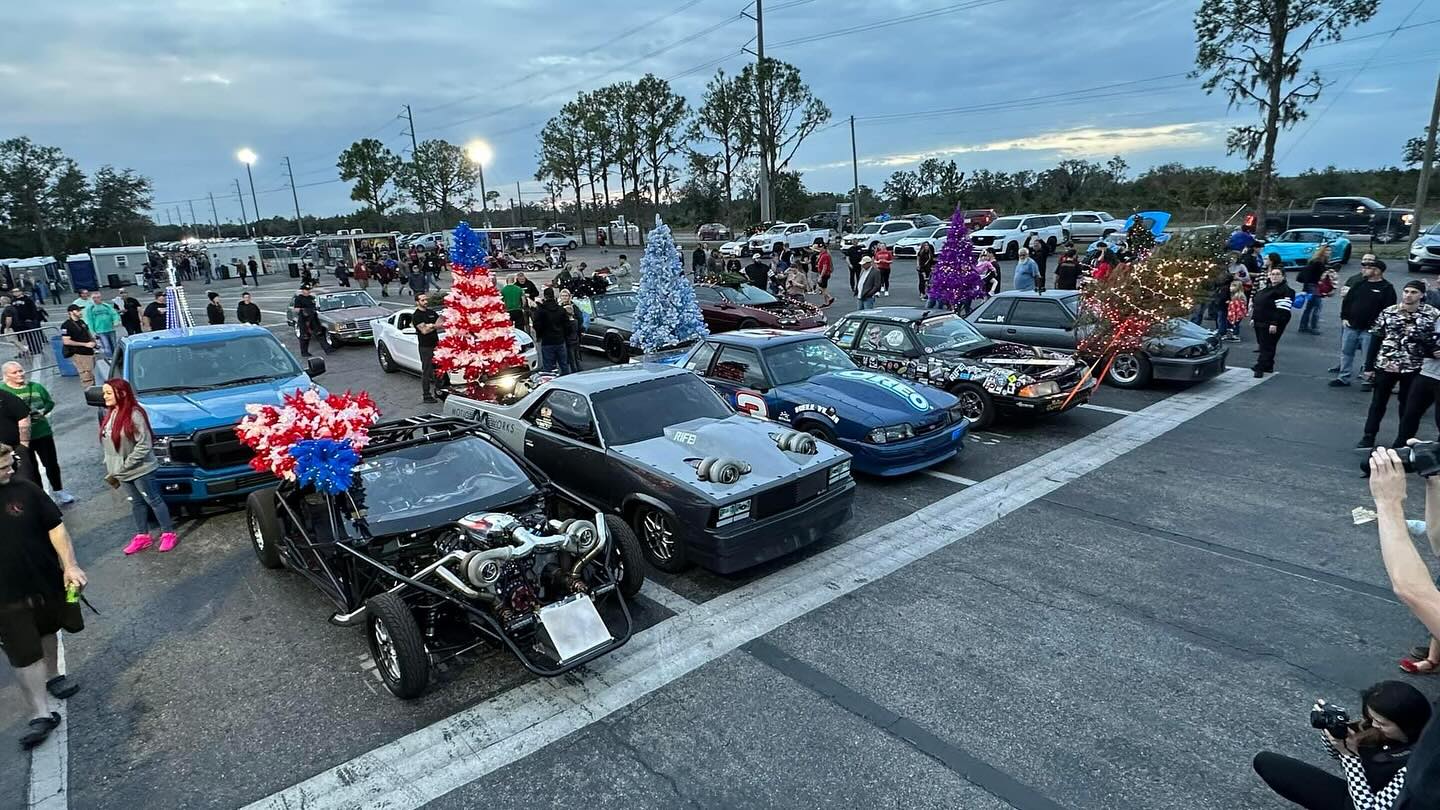 Race cars lined up at the track