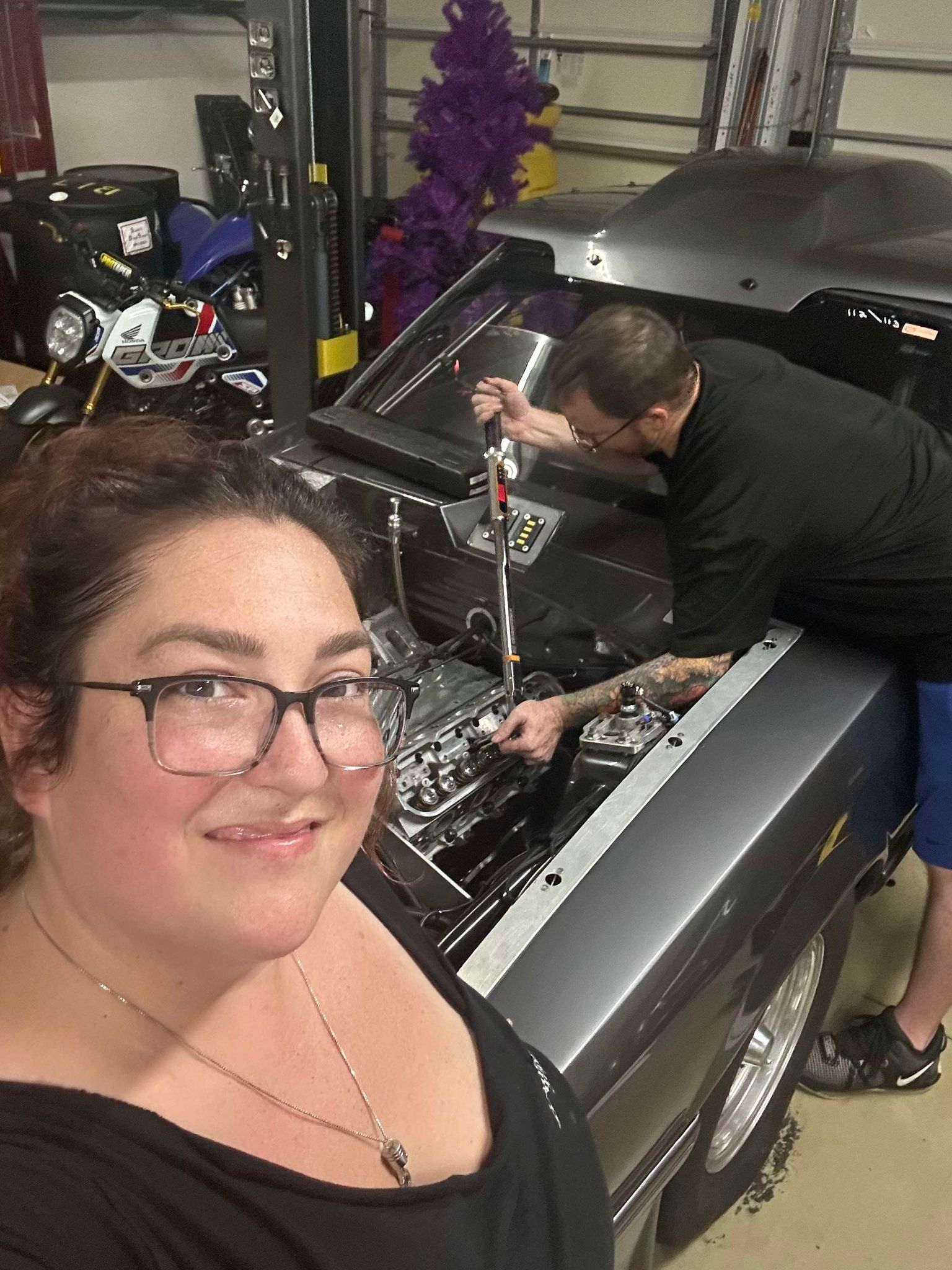 Working on the Foxbody in the garage